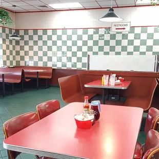 a red table and red chairs