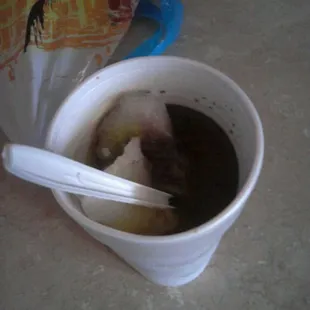 Girl wit brown black mess snowball up. AP