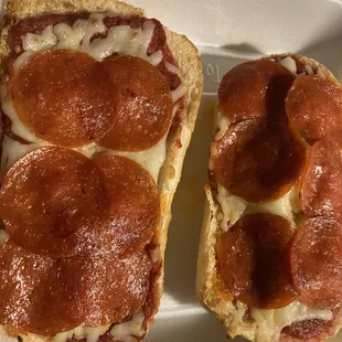 Pizza bread had pepperoni again; tasty surprise this evening.