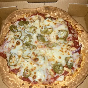 Chicken tikka pizza--their spicy marinated chicken was under the cheese this time with onions &amp; jalapeños atop.