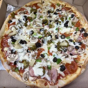 Supreme Pizza with pineapple and jalapeños...