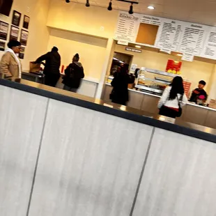 people waiting at the counter