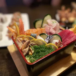 a variety of sushi and other foods