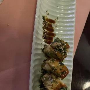 Dragon roll he ate 1/4. Usually he finishes the whole thing