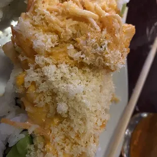 Expensive lobster roll soaked in spicy mayo