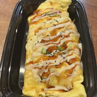 an omelet in a plastic container