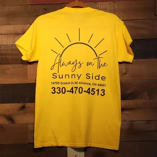 a yellow t - shirt with the words always on the sunny side
