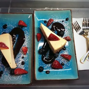 Cheesecake w/ strawberries and blueberry balsamic sauce
