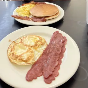 Sunny side combo and two eggs over hard with turkey bacon