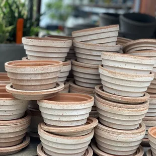 a stack of clay pots