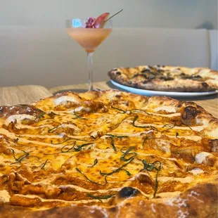 Mumbai Chicken Pizza Peach Bellini and The Truffle C