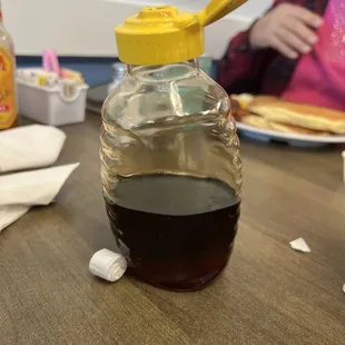 Honey contained microwaved till it melted.