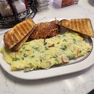 Veggie omelet with hashbrowns and toast