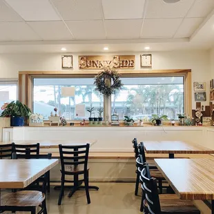 a restaurant with tables and chairs