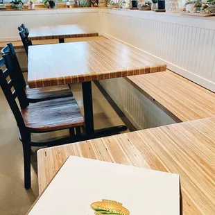 a table and chairs in a restaurant
