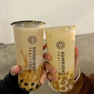 Oolong Milk Tea with brown sugar boba and Mango Milk Tea with honey boba