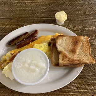 3 egg ham, cheese, and onion omelet. 3 links of breakfast sausage. Grits. 2 slices of wheat toast.