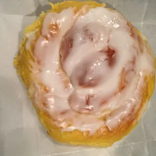 a cinnamon roll with icing
