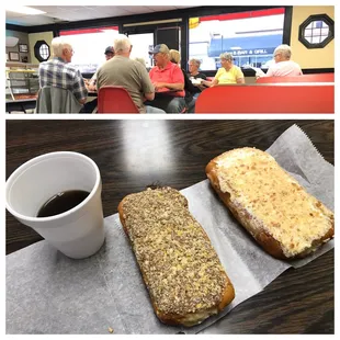 a coffee cup and two pastries