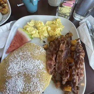 Chocolate chip pancake meal with side of bacon