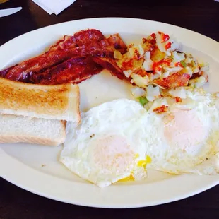 Bacon, two over easy eggs, home fries platter! love it!