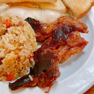 Tocino (it's a fatty cut of pork cooked in a sweet sauce)