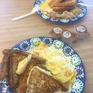 Eggs, toast and turkey (back) + French toast and eggs (fore)