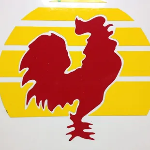 a rooster on the side of a truck