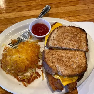 Breakfast sandwich with hash browns, Extra crispy yum.