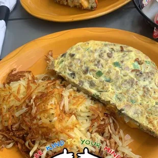 a plate of food with a sandwich on it