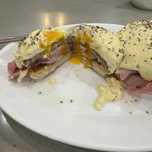 Eggs, Benedict, with perfectly poached eggs, just a little bit runny.