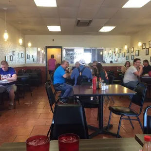 diners sitting at tables in a restaurant
