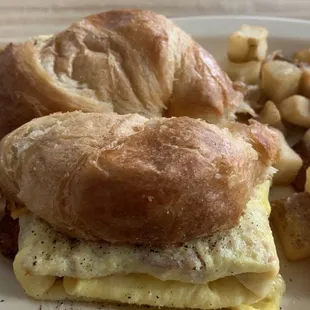 Ham &amp; egg Sunrice Croissant with home fries
