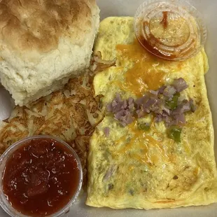 Texas omelette with biscuit and hash browns