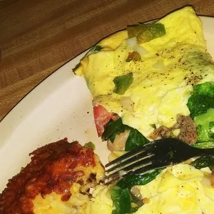 Veggie omelet with cheese home fries hash