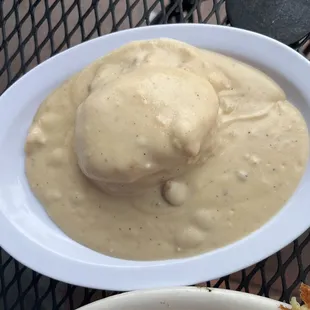 Side of Biscuit and Gravy. Flavorless gravy but fluffy biscuit