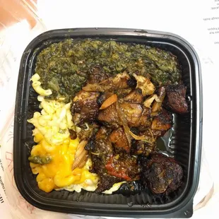 Jerk chicken spinach and Mac and cheese take out