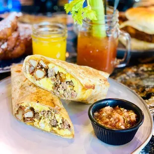Breakfast burrito  with bottomless mimosas and Bloody Mary