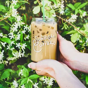 Iced latte and a jasmine flower backdrop courtesy of our patio
