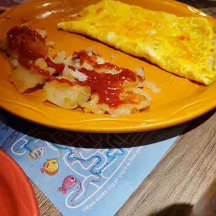 Egg and cheese omelet with home fries kids size.