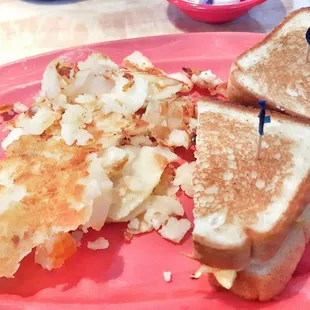 Bacon melt with home fries.