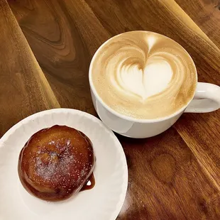 a cup of coffee and a doughnut