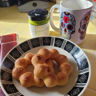 Plain mochi donuts that I popped into the toaster for some extra crunch and some matcha spread I have.