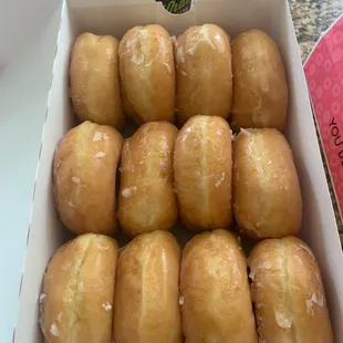 a dozen donuts in a box