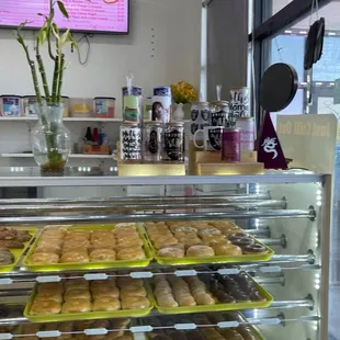 a display of donuts in a bakery