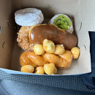 a variety of donuts in a box