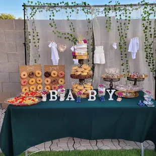 a table with a baby shower theme