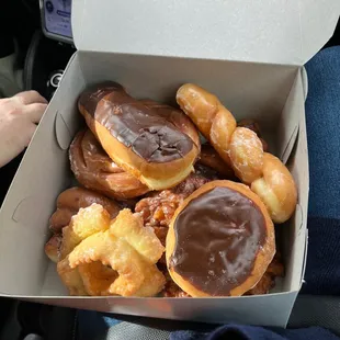 Eclair, glaze twist, old fashion, Apple fritter, and cinnamon roll. Yum Delish!!