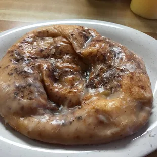 a glazed donut on a plate