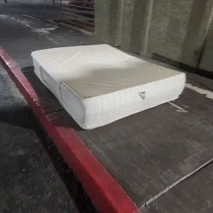 Dirty mattress outside the &quot;hotel&quot;